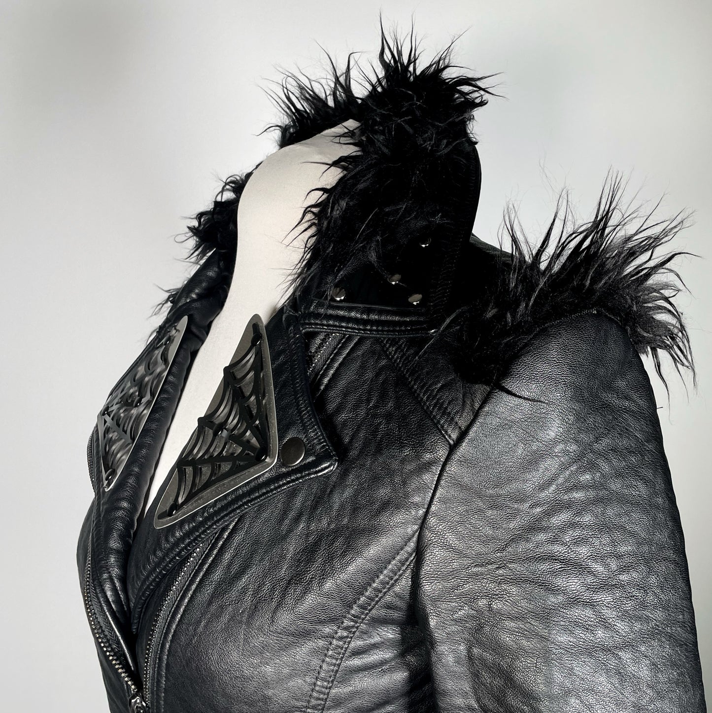 Black Pleather Moto with Metal Plating, PVC Spiderwebs, Faux Fur Trim and Chains