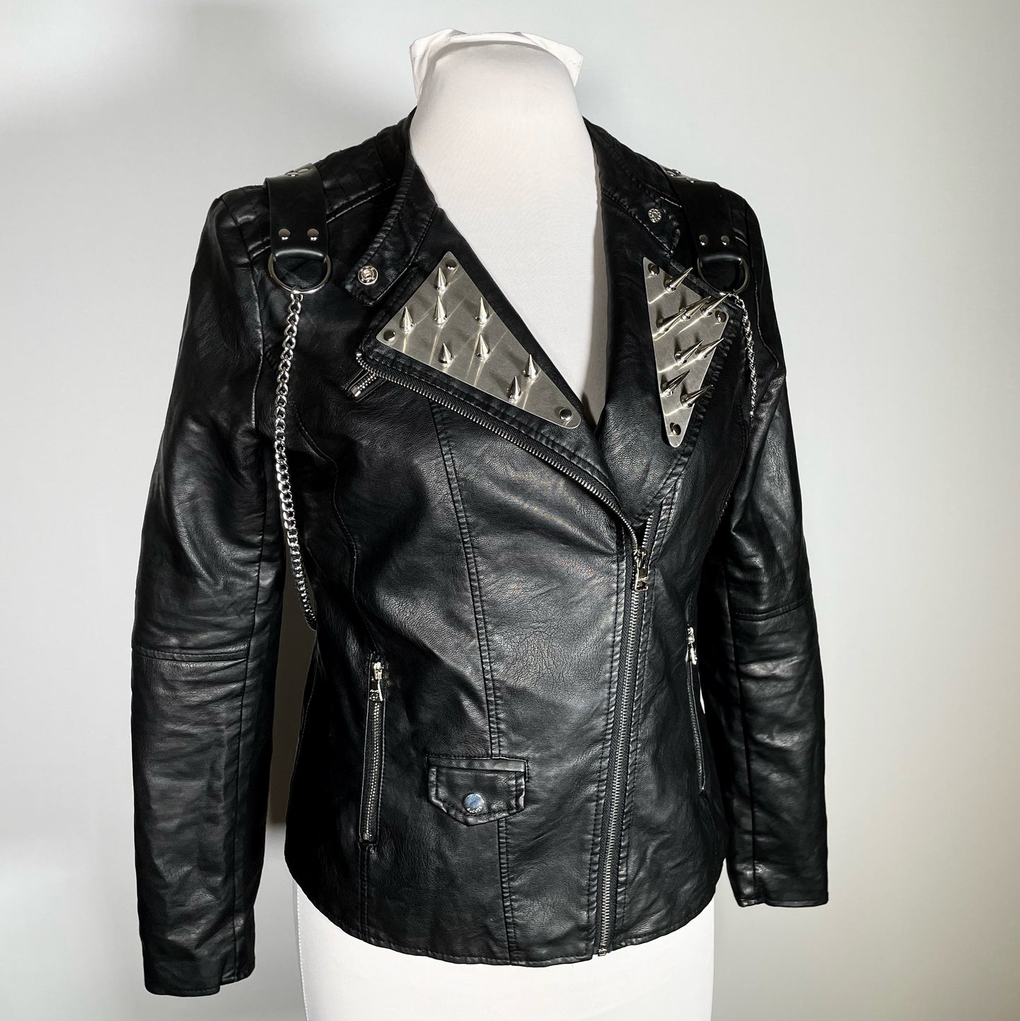 Black Pleather Moto Jacket with Metal Plating and Spikes and Harness back