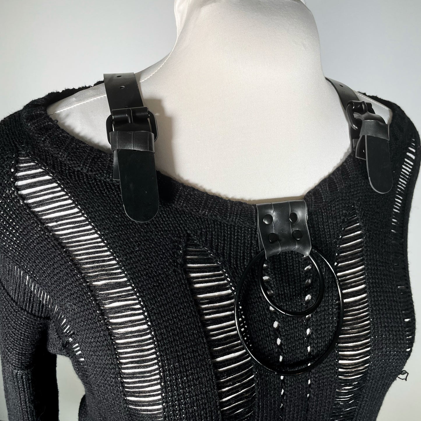 Black Distressed Sweater with Black Rubber and Black Hardware Accents