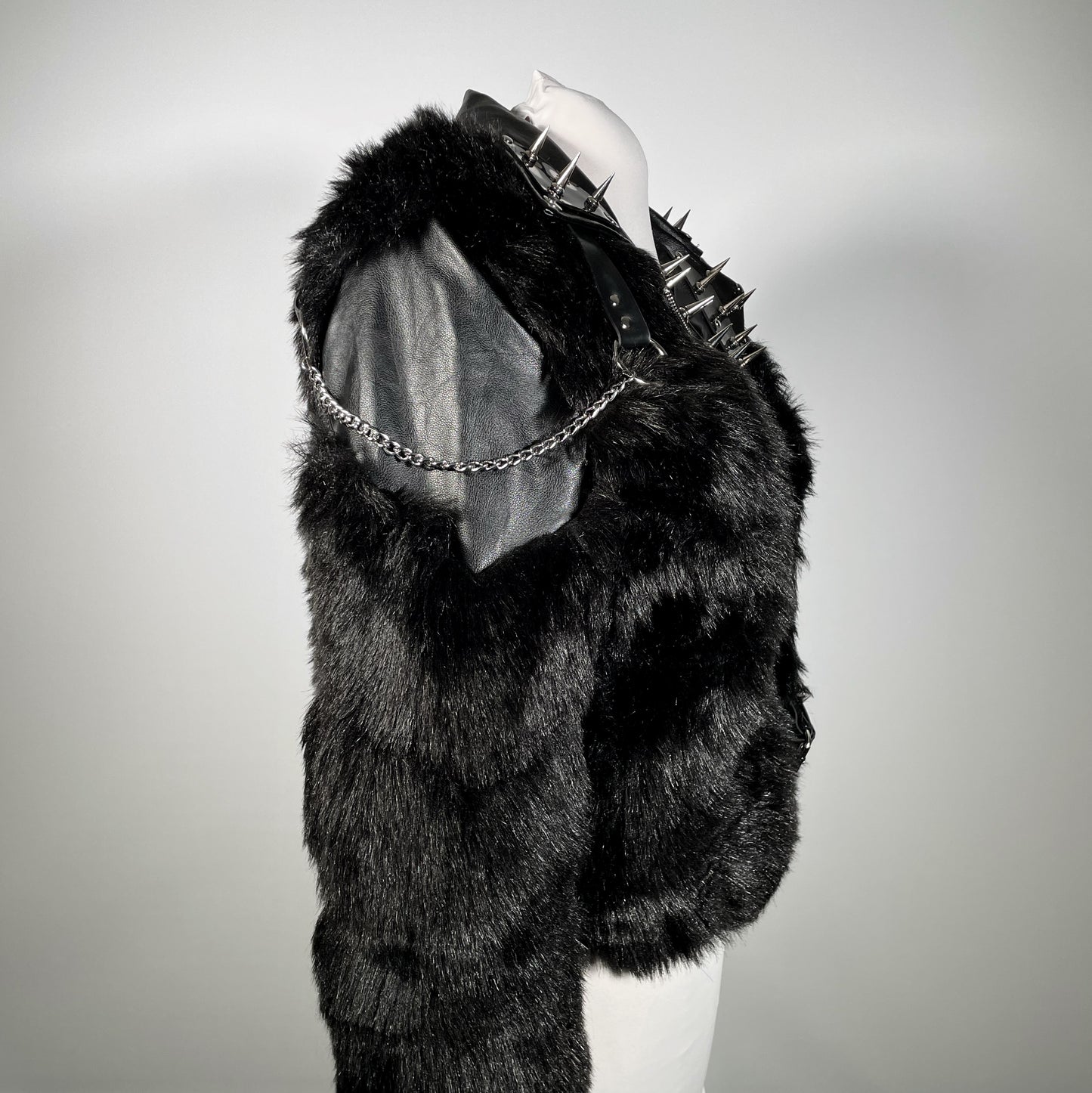 Black Pleather and Faux Fur Jacket with PVC Spiked Lapels and Harness Shoulders