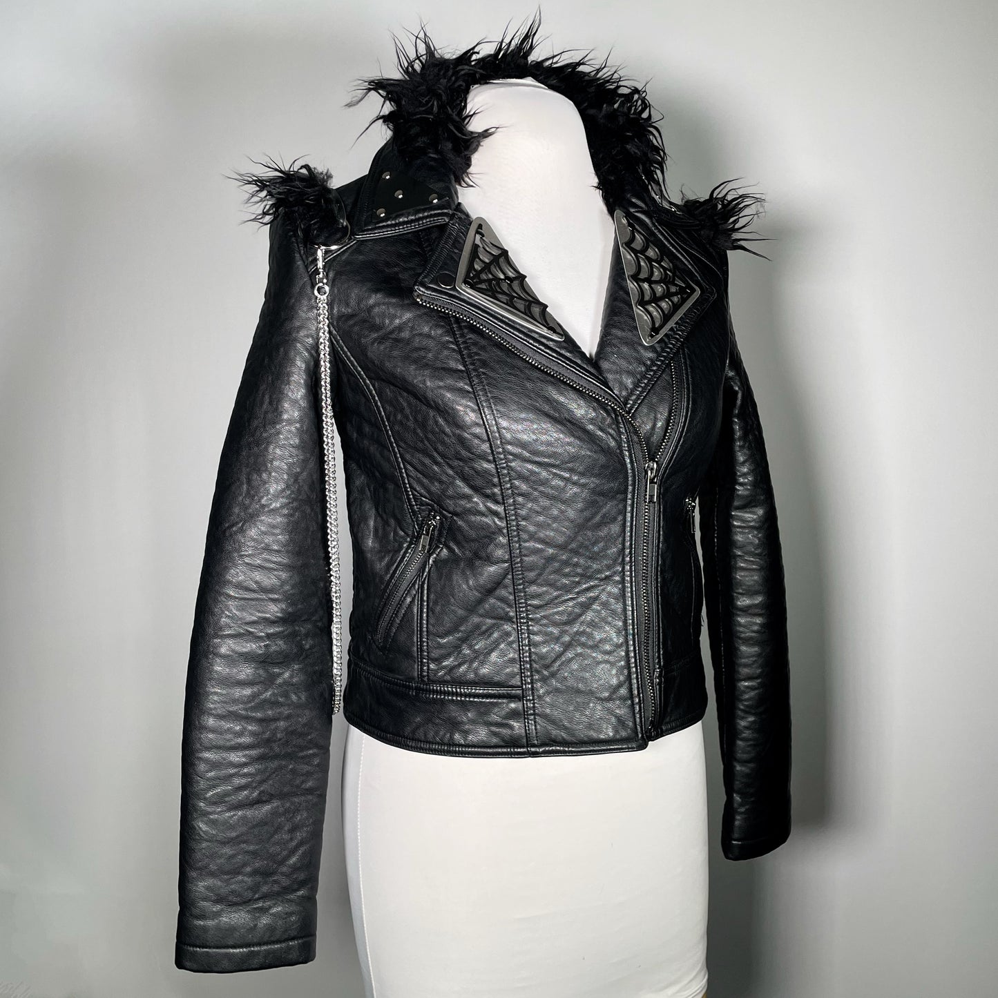 Black Pleather Moto with Metal Plating, PVC Spiderwebs, Faux Fur Trim and Chains